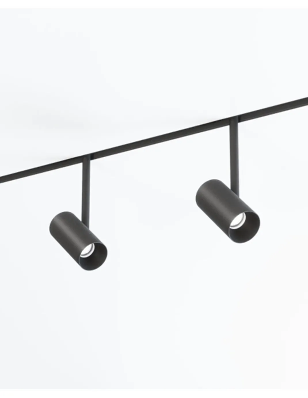 Proyector de carril 48V Dot – Beneito & Faure – Lámpara LED 2700K/3000K, Cabezal orientable 355º, Acabados: blanco/negro
